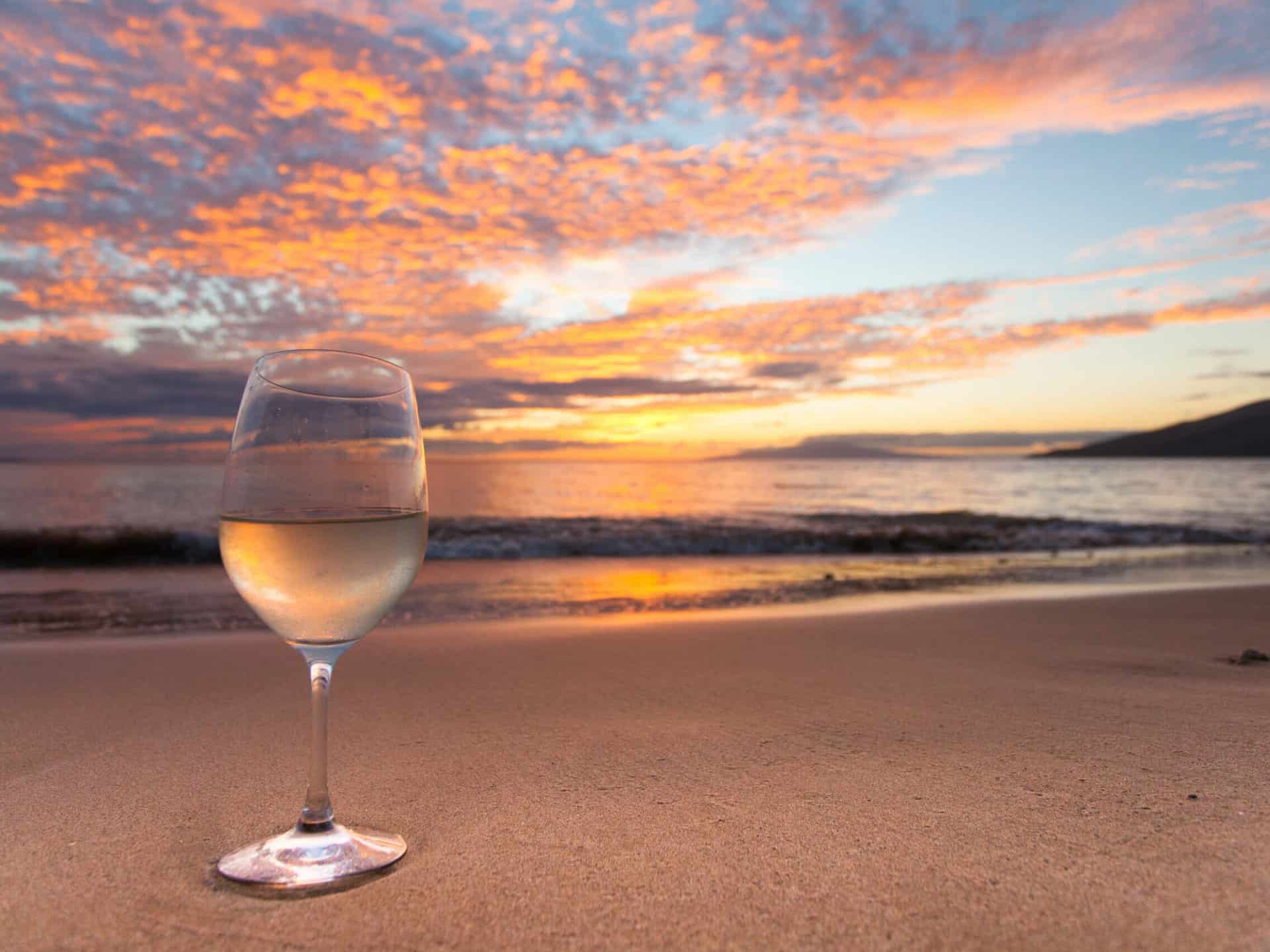 Wine Glass on the Beach in Hawaii at Sunset